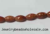 CGS69 15.5 inches 6*10mm rice goldstone beads wholesale