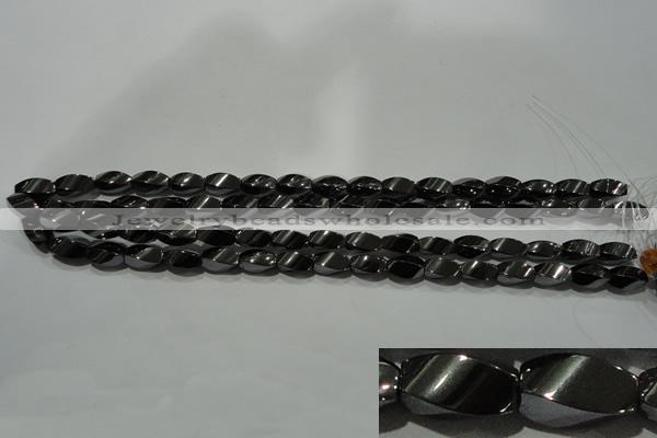 CHE161 15.5 inches 6*12mm twisted rice hematite beads