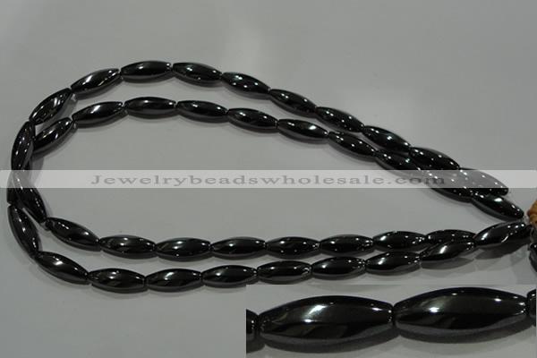 CHE168 15.5 inches 7*20mm faceted & twisted rice hematite beads