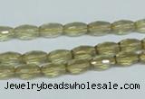 CLQ10 15.5 inches 6*10mm faceted rice natural lemon quartz beads