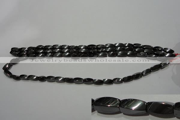 CMH152 15.5 inches 5*11mm twisted rice magnetic hematite beads