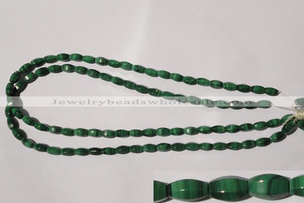 CMN223 15.5 inches 5*9mm faceted rice natural malachite beads