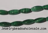 CMN224 15.5 inches 5*12mm faceted rice natural malachite beads