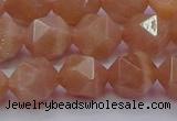 CMS1134 15.5 inches 12mm faceted nuggets peach moonstone beads