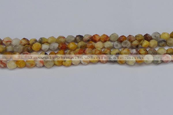 CNG6222 15.5 inches 6mm faceted nuggets yellow crazy lace agate beads