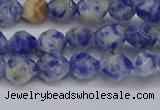 CNG6250 15.5 inches 6mm faceted nuggets blue spot stone beads