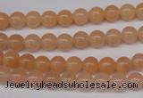 CPE02 15.5 inches 6mm round peach stone beads wholesale