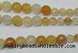 CRO726 15.5 inches 6mm – 14mm faceted round yellow jade beads