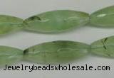 CRU167 15.5 inches 10*30mm faceted rice green rutilated quartz beads