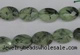 CRU188 15.5 inches 10*14mm faceted oval green rutilated quartz beads