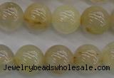 CRU583 15.5 inches 10mm round golden rutilated quartz beads