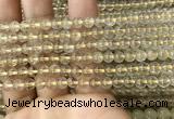 CRU628 15.5 inches 5mm round golden rutilated quartz beads