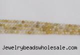 CRU666 15.5 inches 4mm faceted round golden rutilated quartz beads