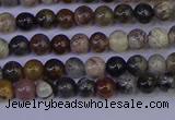 CSL210 15.5 inches 4mm round black silver leaf jasper beads