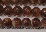 CSS553 15.5 inches 7mm round natural golden sunstone beads