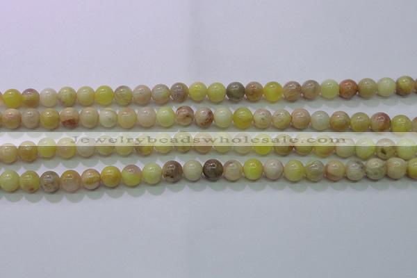 CSS600 15.5 inches 4mm round yellow sunstone gemstone beads