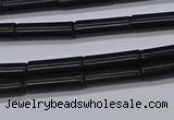 CTB318 15.5 inches 4*13mm tube black stone beads wholesale