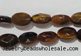 CTE1093 15.5 inches 9*12mm faceted oval yellow tiger eye beads