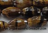 CTE1581 15.5 inches 10*14mm faceted rice yellow tiger eye beads