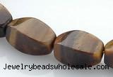 CTE26 8*15mm twisted oval yellow tiger eye beads Wholesale