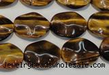 CTE830 15.5 inches 13*18mm wavy oval yellow tiger eye beads