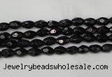 CTO115 15.5 inches 4*6mm faceted rice black tourmaline beads