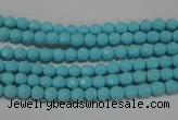 CTU1220 15.5 inches 4mm faceted round synthetic turquoise beads