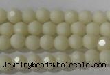 CTU1440 15.5 inches 4mm faceted round synthetic turquoise beads