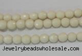 CTU1442 15.5 inches 6mm faceted round synthetic turquoise beads