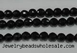 CTU1482 15.5 inches 6mm faceted round synthetic turquoise beads