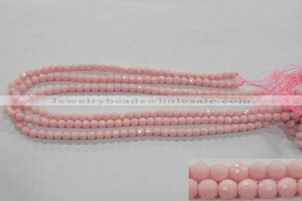 CTU1511 15.5 inches 4mm faceted round synthetic turquoise beads