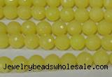 CTU2523 15.5 inches 4mm faceted round synthetic turquoise beads