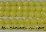 CTU2524 15.5 inches 6mm faceted round synthetic turquoise beads