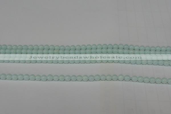 CTU2563 15.5 inches 4mm round synthetic turquoise beads