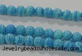 CTU2580 15.5 inches 4mm round synthetic turquoise beads