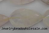 CYC206 15.5 inches 22*38mm twisted & faceted teardrop yellow quartz beads