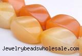 CYJ40 10*14mm twisted rice yellow jade gemstone beads Wholesale