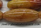 CYJ410 15.5 inches 18*45mm rice yellow jade gemstone beads