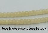 CYJ63 15.5 inches 6*7mm vase-shaped yellow jade gemstone beads wholesale