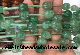 FGBS103 15 inches 10mm carved skull green strawberry quartz beads wholesale